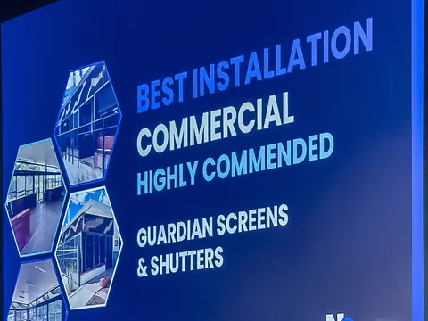 The NSSA awards night screen reading Best Installation Commercial, Highly Commended, Guardian Screens & Shutters
